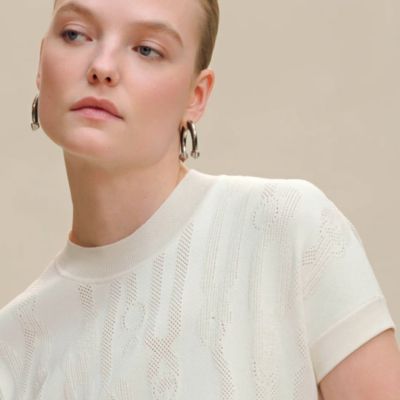 View: video, "Palefroi Remix" sleeveless sweater