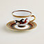 View: Worn, Cheval d’Orient tea cup and saucer n°1