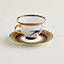 View: Worn, Cheval d’Orient tea cup and saucer n°1