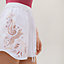 View: Worn, Embroidered beach shorts