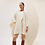 View: Worn, Embroidered cashmere cape with leather detail