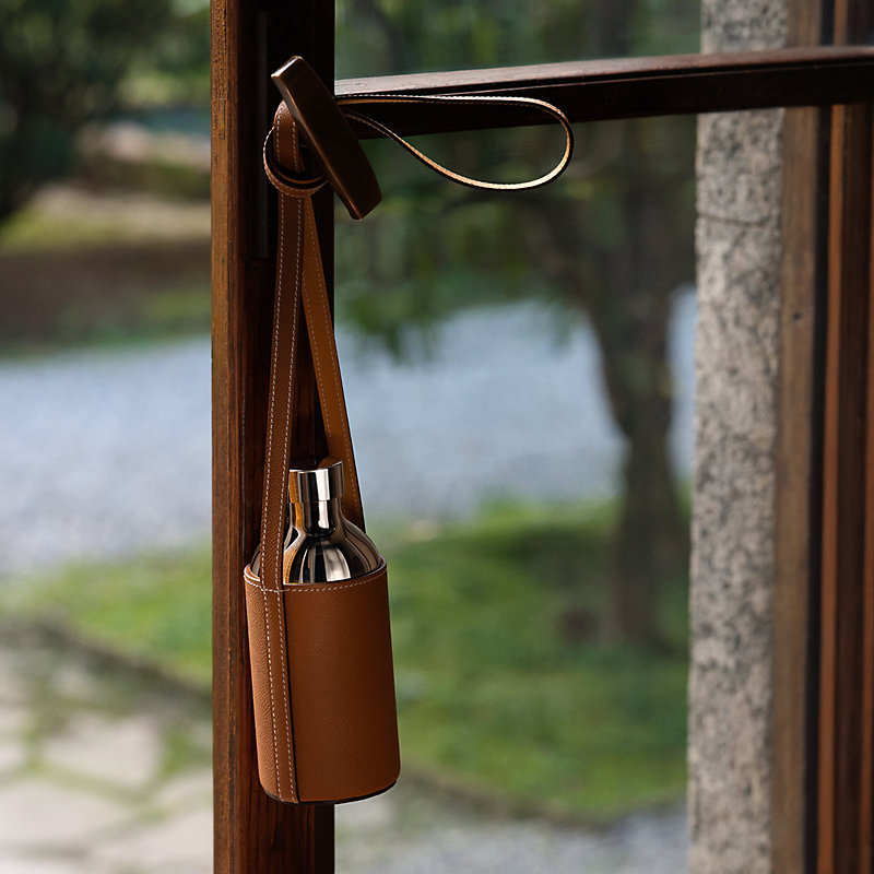 Flaneuse water bottle and shoulder strap