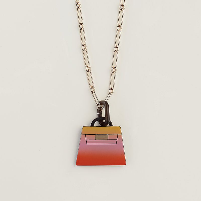 hermes kelly amulette pendant