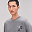 View: Worn, "H Puzzle" t-shirt with leather detail