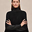View: Worn, "H" rectangular cape poncho