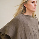 View: Worn, "H" rectangular cape poncho