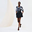 View: Worn, High-waisted smocked skirt