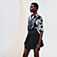 View: Worn, High-waisted smocked skirt