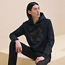 View: Worn, "Metallerie au Carre" hooded sweater with leather detail