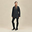 View: Worn, Quilted coat