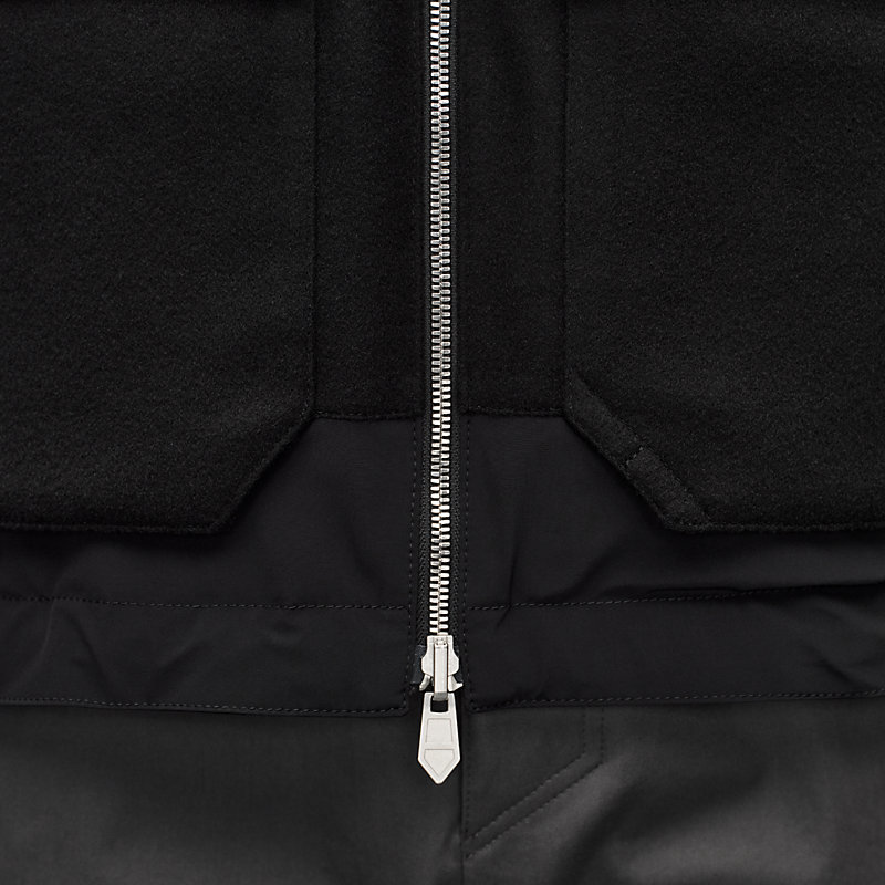 Reversible hooded vest