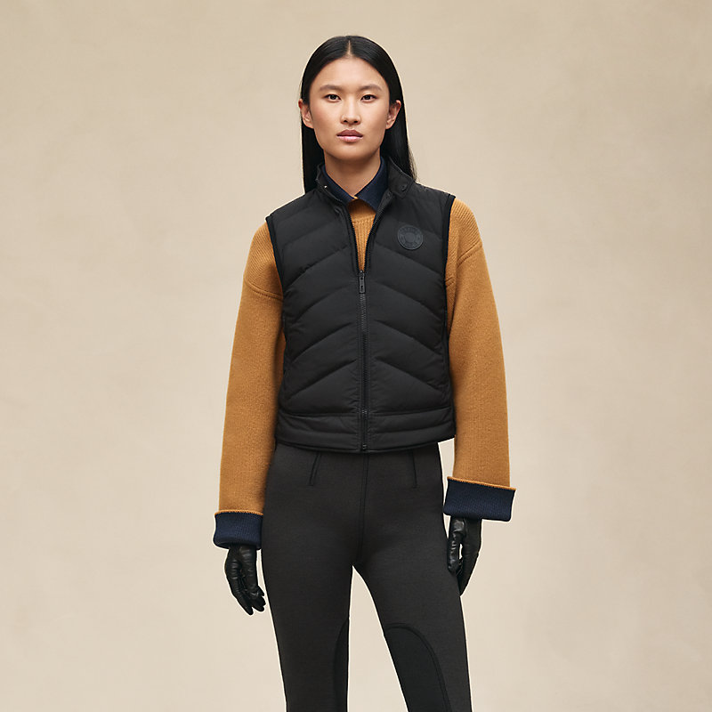 Reversible sleeveless jacket