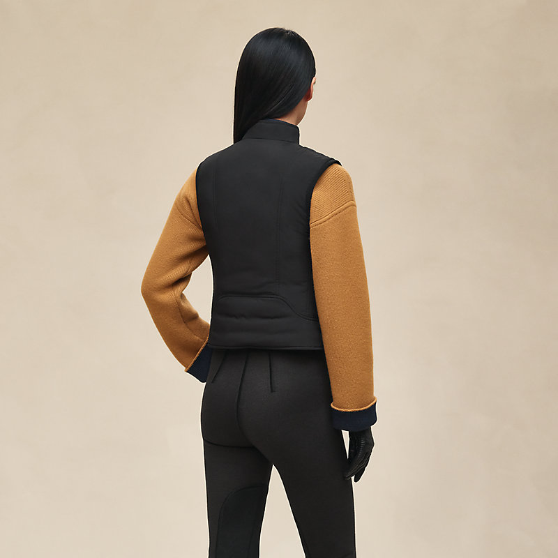 Reversible sleeveless jacket