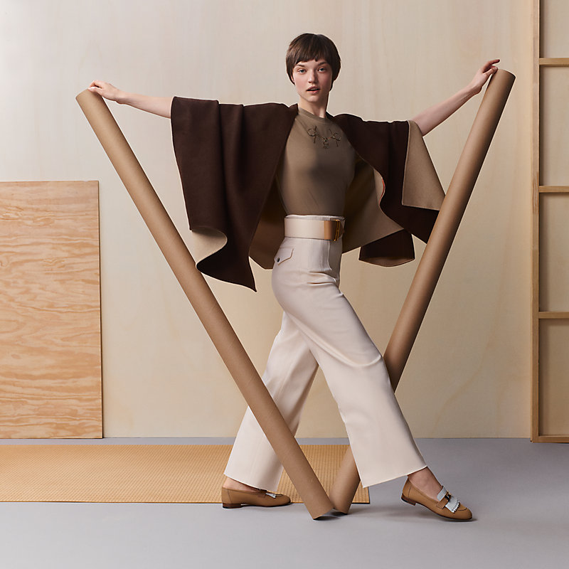 Single-sleeved reversible cape