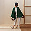View: Worn, Single-sleeved reversible cape