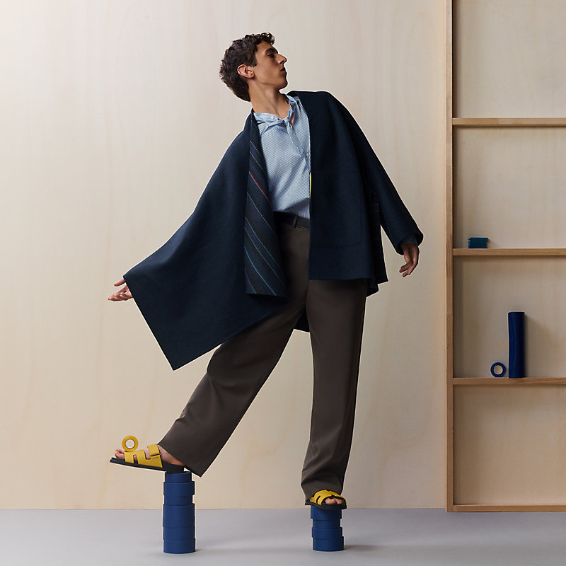 Single-sleeved reversible cape