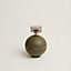 View: front, Spherical music box with a crystal key