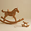 View: Worn, Spirit pull-along horse with rope